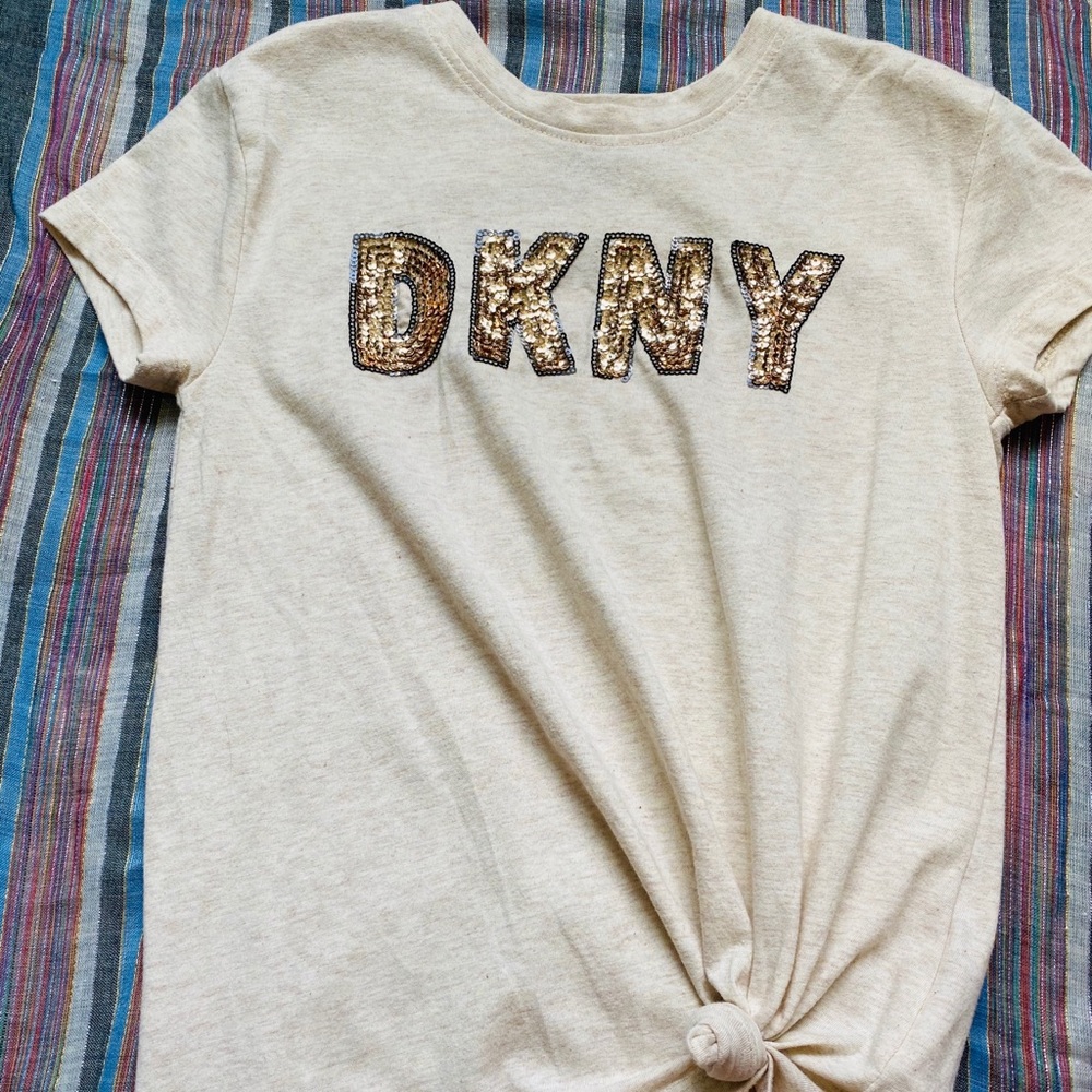 Girls size 7 (small) DKNY sequin logo tee